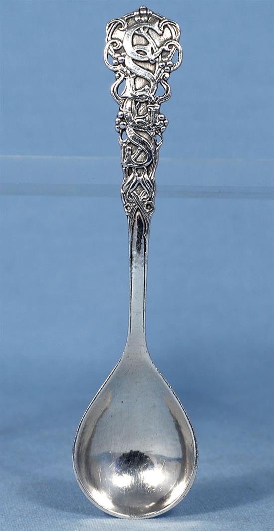 A George V Arts & Crafts cast planished silver spoon, by Omar Ramsden, Length 161mm Weight 1.9oz/61grms